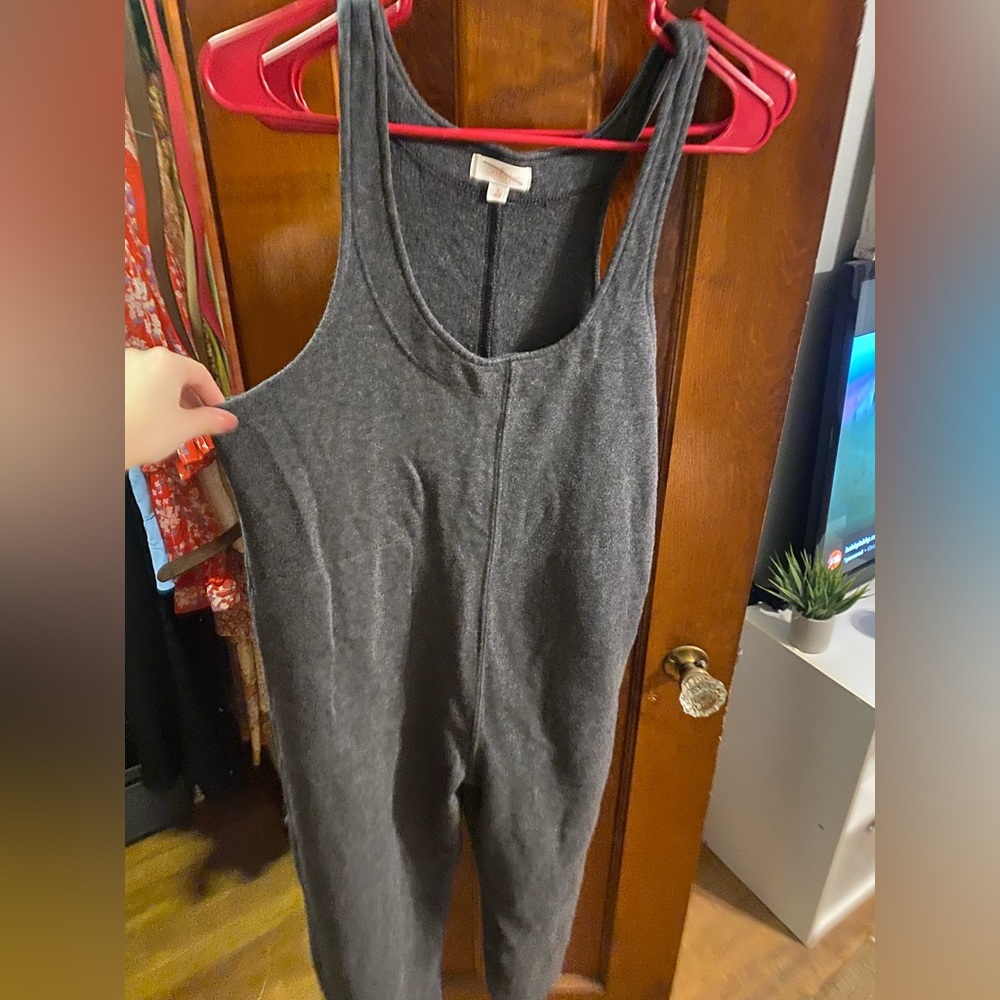 Size small. Thick and warm on the inside jumpsuit
